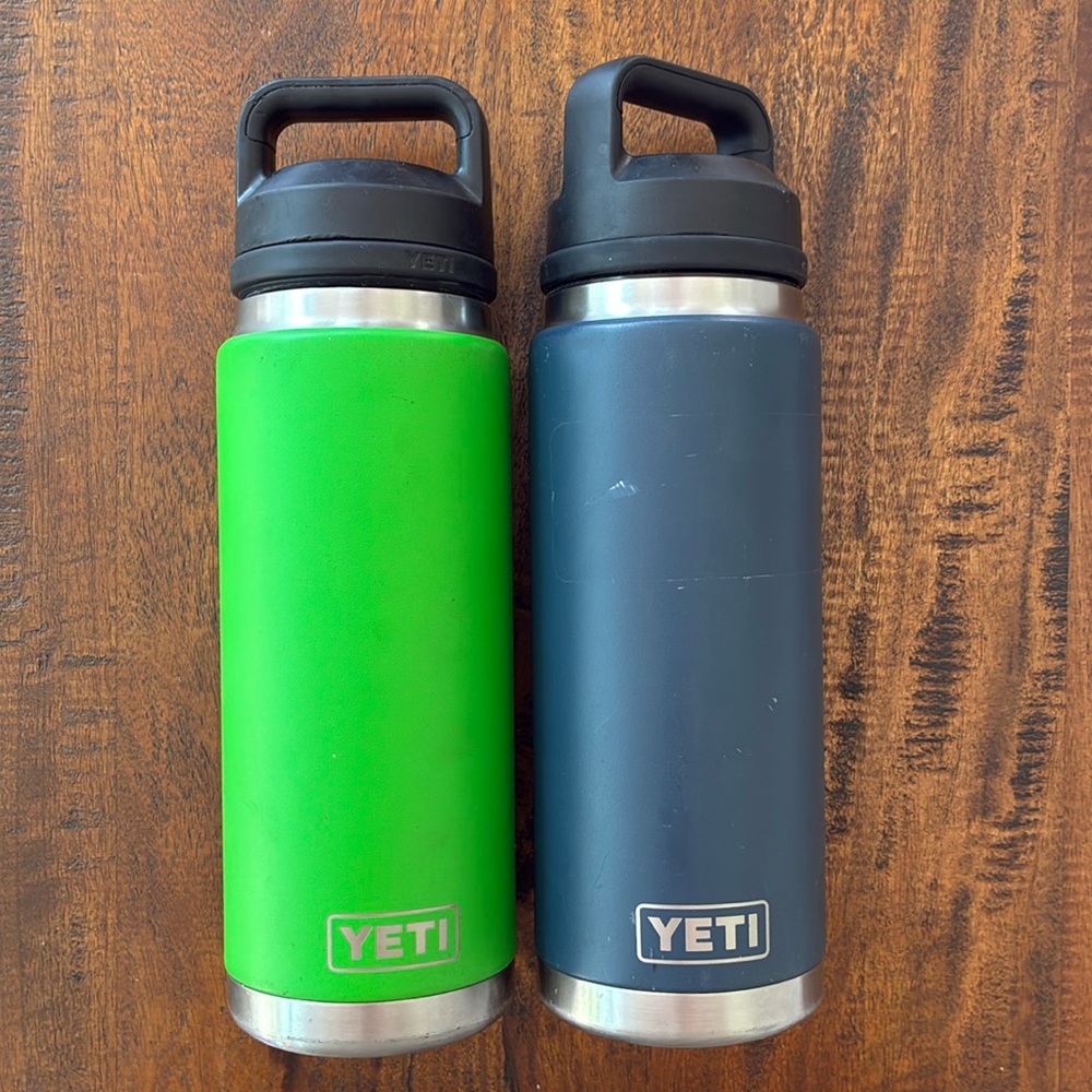 2 - Yeti 26 oz. Rambler water bottles with Chug Cap. 1 Navy and 1 Canopy Green
